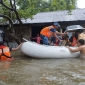 ফেনী জেলার বন্যার্তদের উদ্ধার ও ত্রাণ বিতরণ করছে কোস্টগার্ড